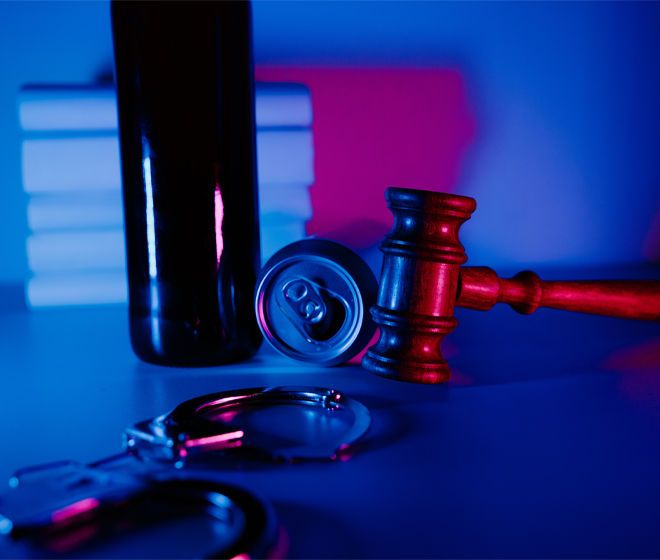 gavel and handcuffs on table
