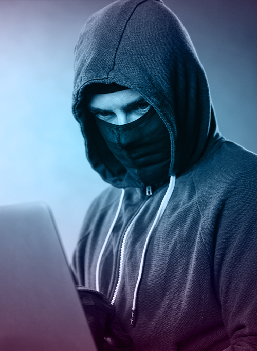 hacker wearing hoodie and mask