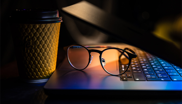 spectacles on a laptop keyboard